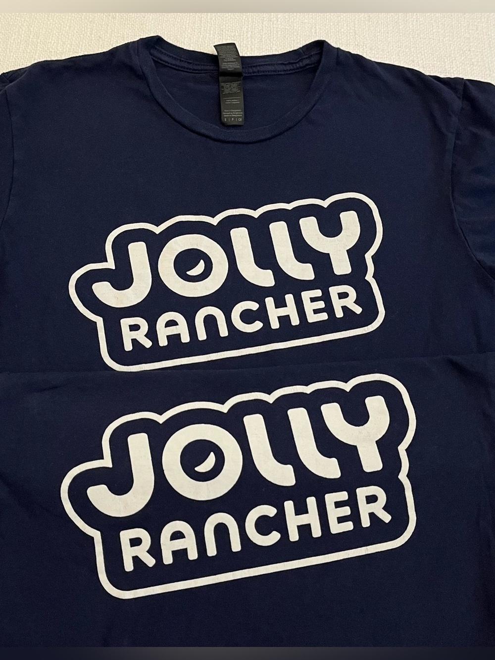 2 Jolly Rancher Shirts Small Navy blue Jolly Rancher cotton with white logosize
